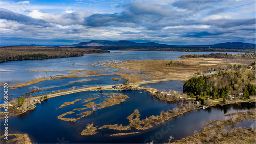 Tupper Lake, NY, USA - April 29, 2026  Aerial photo captures the Raquette river and surrounding wetlands of Tupper Lake in New York's Adirondack Mountains.
