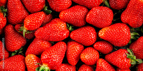 Strawberries ripe, juicy berries tasty snack fresh, delicious gourmet food background on the table, rustic food top view copy space keto and paleo diet vegetarian and vegan food