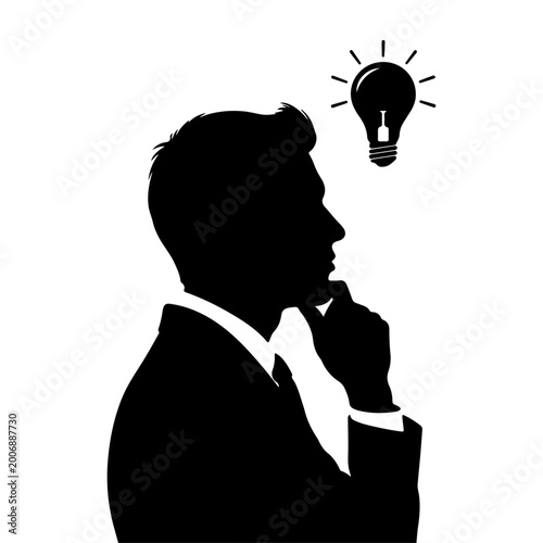 Silhouette of a thoughtful businessman with a glowing idea lightbulb above his head