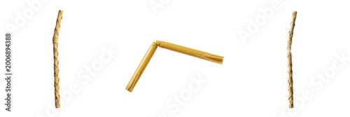 Detailed macro of three natural wicker pieces or rattan strands on a white background, featuring two vertical sticks and one broken angled segment, ideal for craft, weaving, and furniture design.