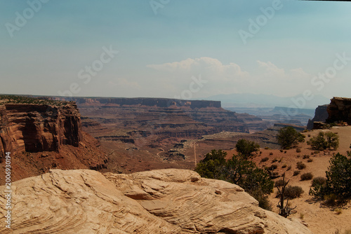 Fotografi Expansive Sandstone With Distant Buttes