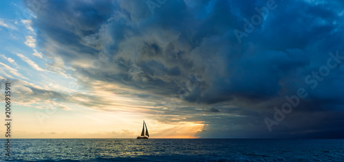 Sunset Inspirational Dramatic Approaching Storm Clouds Sailing Sailboat Ocean Hope Faith Journey Adventure Banner Header