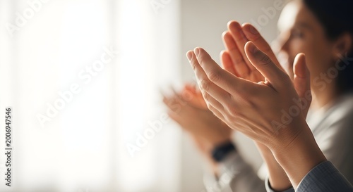 Close-up of Hands Clapping in Applause during a Business Seminar or Corporate Event to Celebrate Success and Recognition