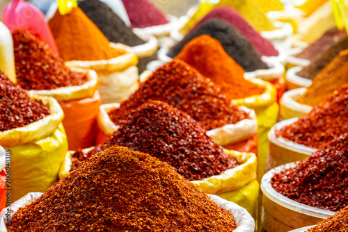 Mounds of Vibrant Spices at an Outdoor Antalya, Urfa, Gaziantep, Hatay Street Market . Various bright colored powder spices on market in Istanbul, Turkey. Turkish  colored spices at old bazaar  market