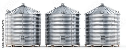 Three large industrial grain silos standing in a row against a white background.