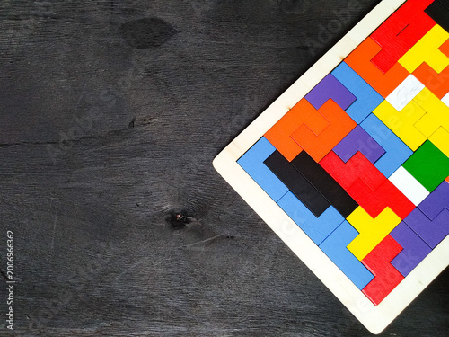 Puzzle with brain sharpening concept on black background