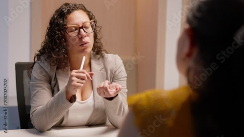 Confident businesswoman explaining strategy to colleague