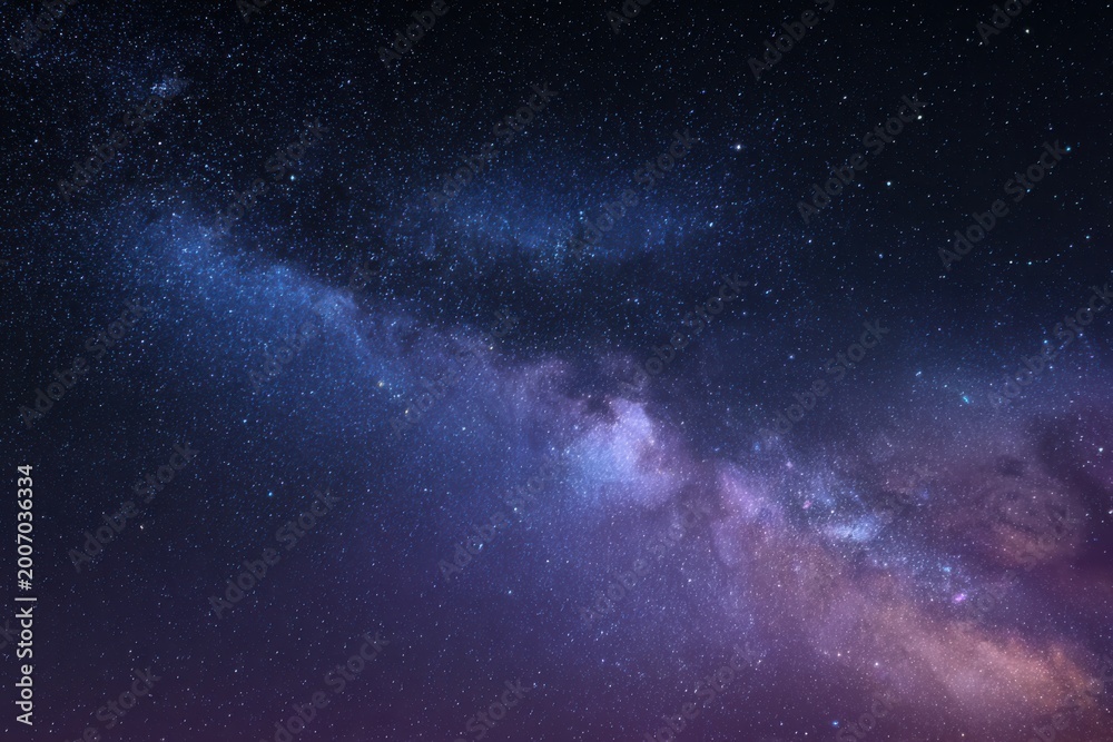 Obraz premium Vast Milky Way Galaxy Swirls with Nebulae and Stars in Deep Space.