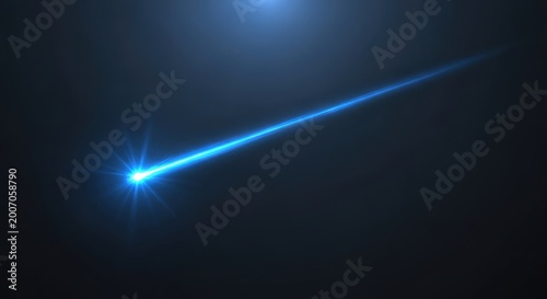 A bright blue streak of light shoots across a dark night sky