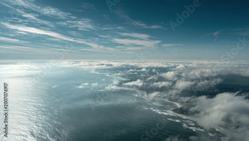 Aerial View of Ocean and Clouds from Above.