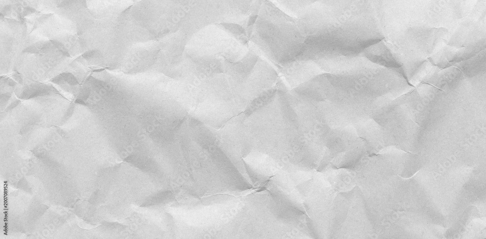 Naklejka premium white paper wrinkled poster template ,blank glued creased paper sheet mockup.white poster mockup on wall. empty paper mockup.