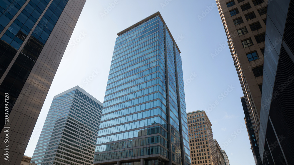 Obraz premium Modern high-rise tower in sleek business district, photorealistic architecture