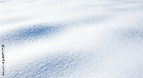 Pristine white snow cover with a soft powdery texture under bright daylight, creating an ideal minimalist winter backdrop for copy space, seasonal, space, snow