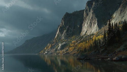 Majestic Mountain Range Reflected in Calm Lake Under Dramatic Cloudy Sky.