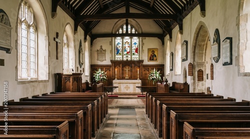 Interior view of a traditional english village church with wooden pews