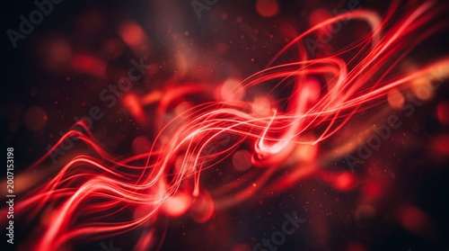 Vibrant red abstract light trails with dynamic swirling patterns and glowing bokeh effects