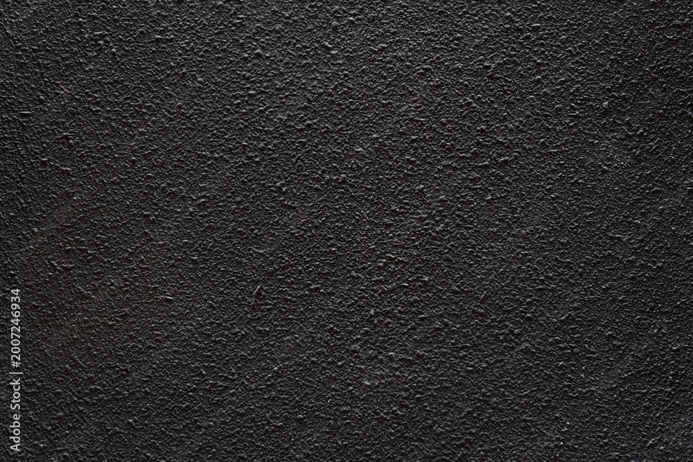 Fototapeta premium Dark black rough wall textured background wall