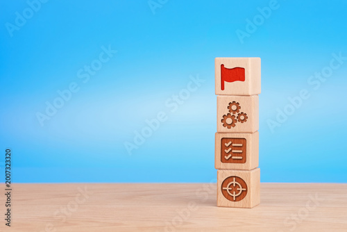 Goal achievement concept with stacked cubes