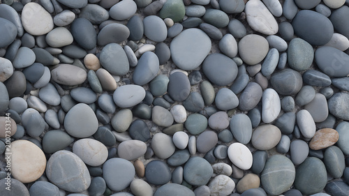 Smooth gray and beige river rocks texture background