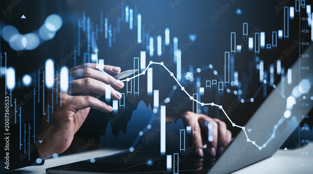 Obraz premium Hands analyzing digital stock market graph interface with glowing forex chart signals and investment data overlay on screen background.