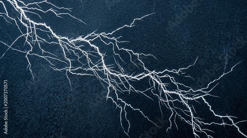 Bright lightning strike illuminates the dark stormy sky