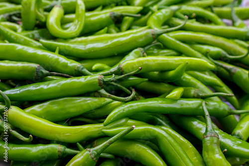 Fresh chilies or chili peppers background. Spicy vegetable. Also called Mirchi or Paprika.