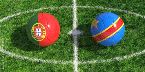 Obraz na płótnie Soccer balls with portugal and congo flags on a green football pitch background