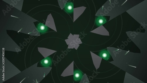 Green lights shine on geometric shapes in a dark abstract design
