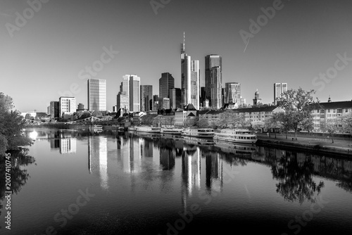 view to Frankfurt skyline with reflection of skyscraper in River Main