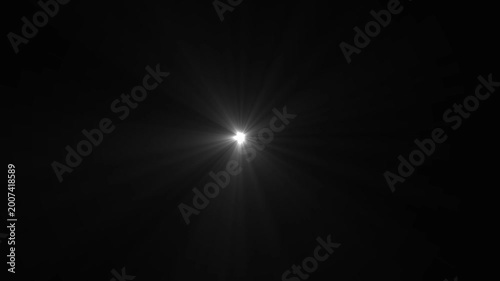 Bright White Starburst Light Effect on Black Background flare glow