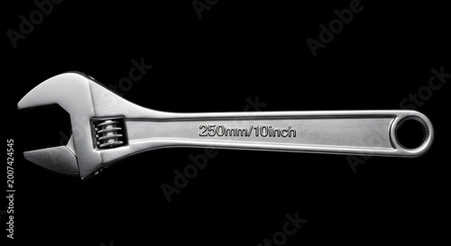 Adjustable wrench with 250mm10inch length on black background