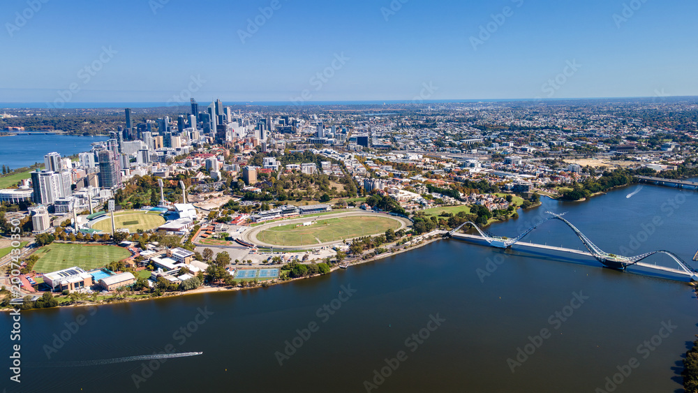 Fototapeta premium Stunning aerial view of Perth's skyline beside the tranquil Swan River on a clear sunny day