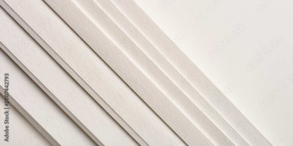 Obraz premium Textured paper layers create a subtle, elegant diagonal background pattern