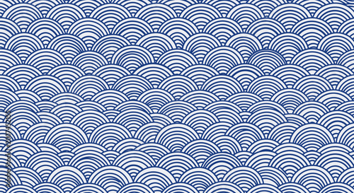 Fotografie Traditional Japanese Seigaiha wave pattern in blue and white.