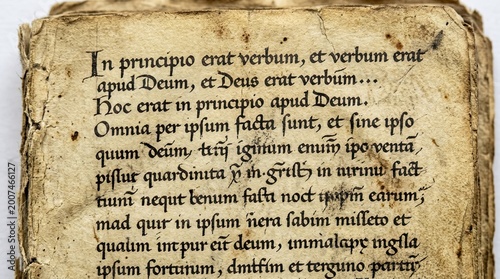 Ancient illuminated manuscript page with latin text in gothic script featuring weathered yellowed parchment intricate calligraphy and a sense of historical depth perfect for religious or academic