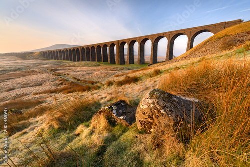 Impressive view of The Ribblehead Viaduct on a glorious sunny spring morning in The Yorkshire Dales, UK.