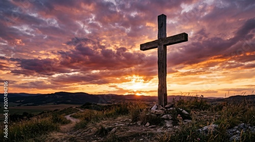 Wooden Christian cross standing against a dramatic sunset sky. Symbol of faith, hope, and salvation. Ideal for religious themes, Easter, prayer, and spirituality
