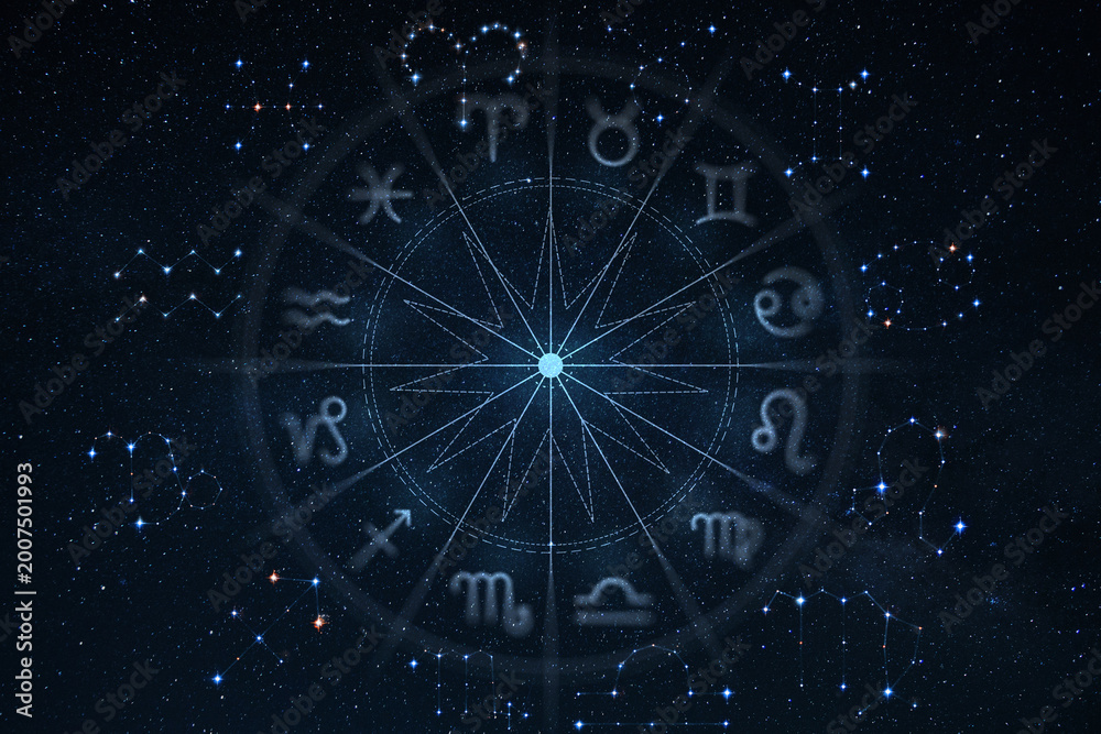 Fototapeta premium Astrological zodiac wheel with twelve signs and constellations over a starry night sky background. Magic, esoteric, and horoscope concept
