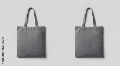 Two grey canvas tote bags for eco friendly shopping and branding mockups are displayed.
