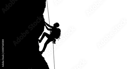 Tableau sur toile Silhouette of a person rock climbing a steep cliff face.