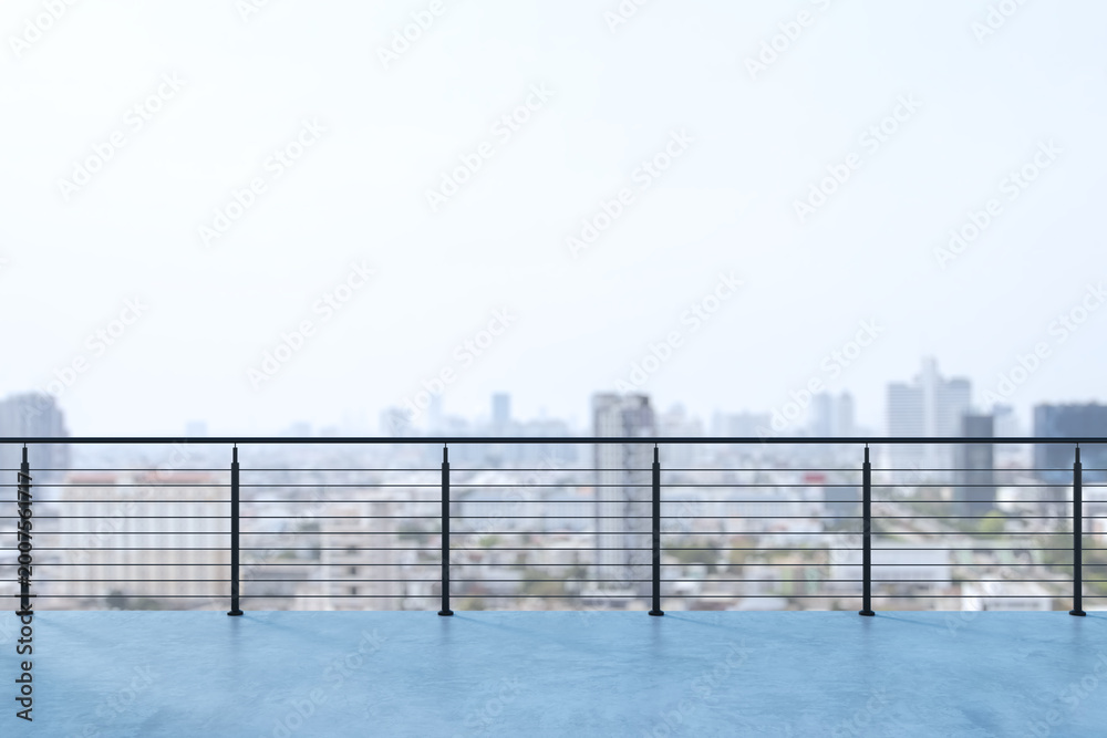 Obraz premium Modern rooftop terrace with sleek metal railing overlooking a softly blurred city skyline under bright light, creating an open urban backdrop and calm rooftop atmosphere. 3D Rendering