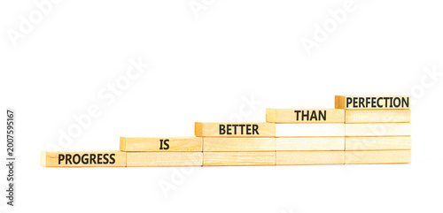 фотографія Progress or perfection words symbol