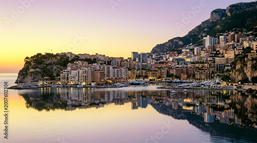 Monaco skyline and Fontvieille harbor reflection at sunrise