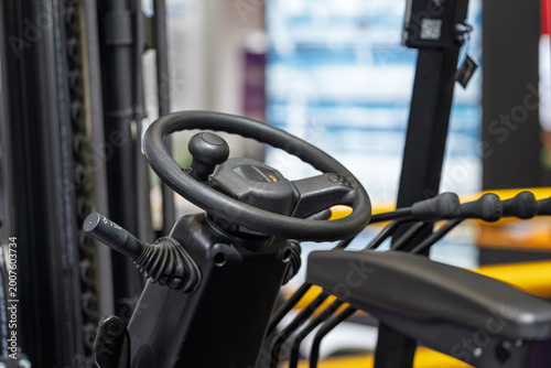 Close up of steering wheel inside forklift cabin