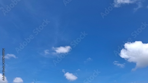 Tableau sur toile Wide scenic background of a beautifully clear vibrant blue sky featuring a singl