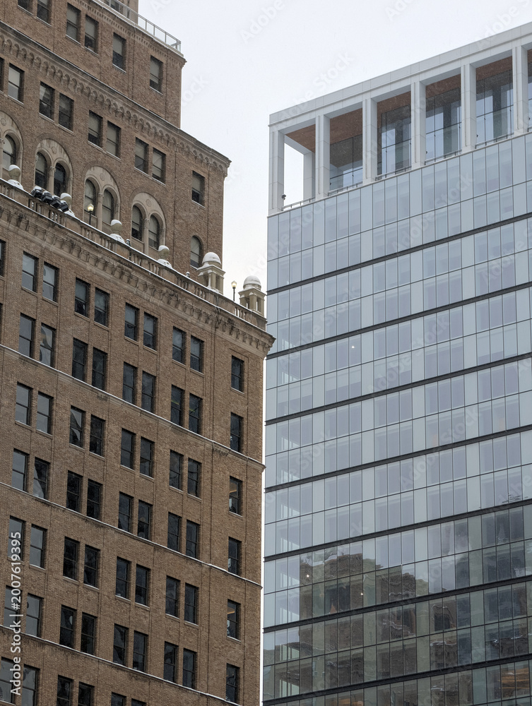 Obraz premium Majestic modern New York skyscrapers reflecting sunlight across iconic Manhattan skyline with towering architecture, urban atmosphere, and vibrant city energy, travel Usa