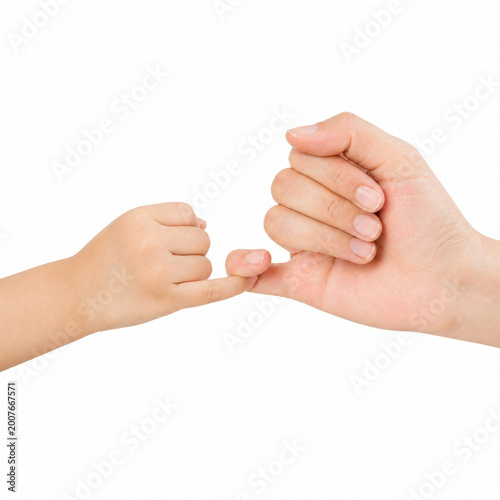 Close-up of an adult's hand and a child's hand pinky promising.