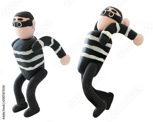 Handmade clay thief character in jumping pose, isolated on white background, representing action, crime concept, and playful storytelling.