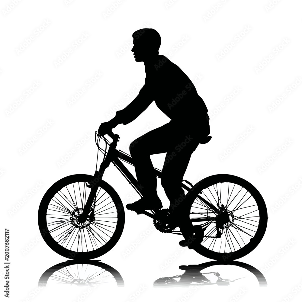 Obraz premium Silhouette of a man riding bicycle.