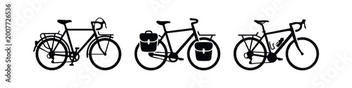 Фотография Set of black bicycle silhouettes including touring, commuter, and adventure bikes with racks and panniers, isolated on a white background